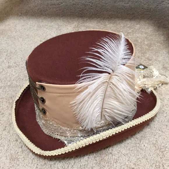 Steampunk brown hat with chain,lace bow and feathers.